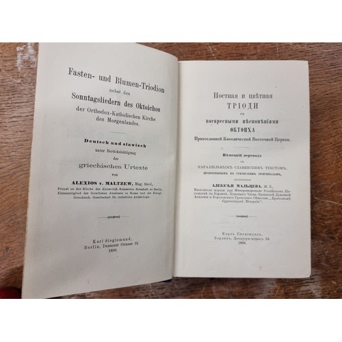 207 - Two antique hardback books including German translations of Orthodox Slavic text based on original G... 