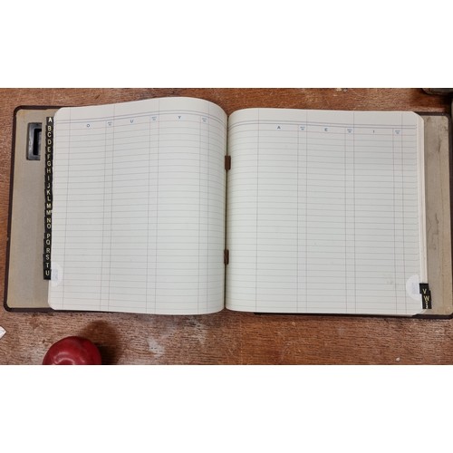 214 - A vintage Twinlock Holborn binder from Brindleys Stationers. This example is blank and features lett... 