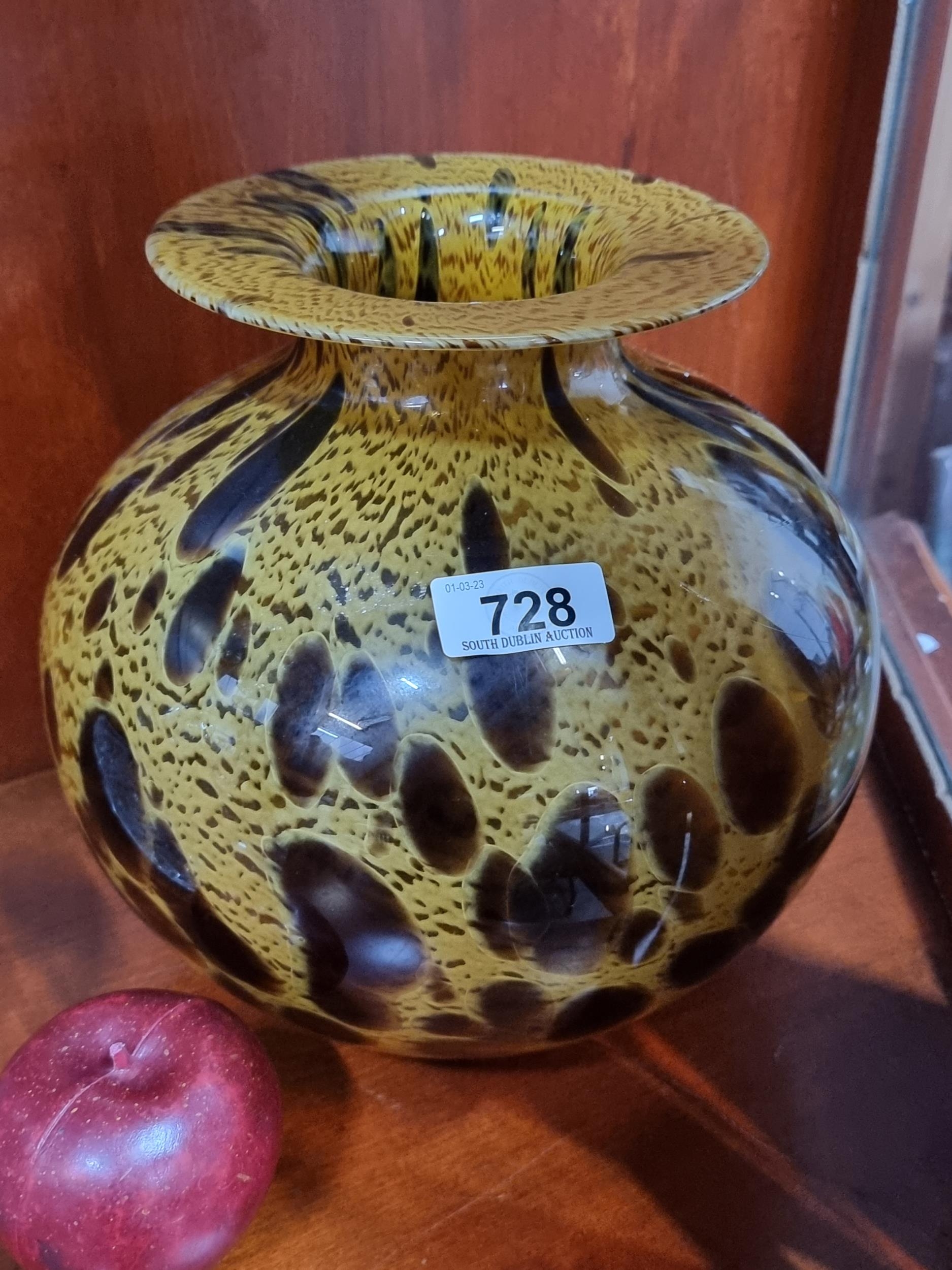 A fabulous art glass bauble vase. This striking piece has a rotund