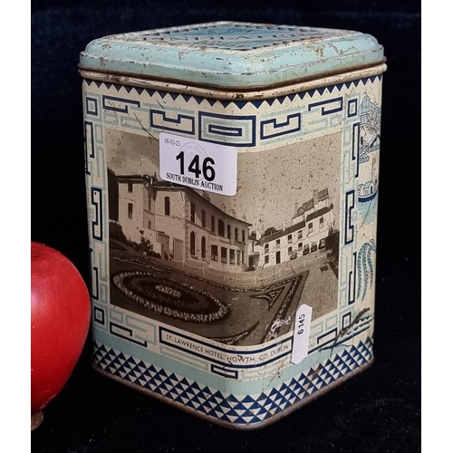 146 - A Findlater's Usual Bend 7/4 Tea Green Label tea caddy. Featuring a local scene of St. Lawrence Hote... 