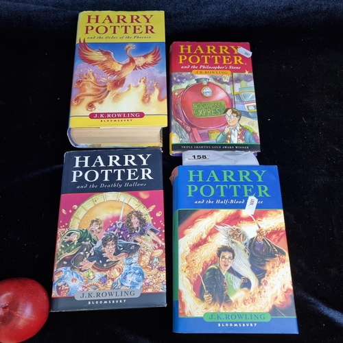 158 - A selection of four first edition hardback books from the much-loved Harry Potter series. Including ... 