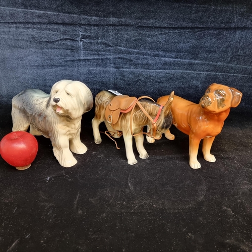 159 - Three charming ceramic animal figures. Including a Melba branded boxer dog and a large Old English S... 