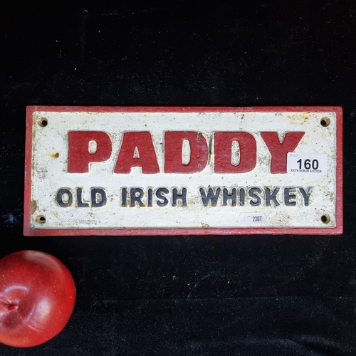 160 - A cast metal advertising wall sign for ''Paddy Old Irish Whiskey'' designed with red text on a white... 