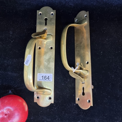 164 - A pair of heavy solid brass door handles. Stamped with maker's mark ''Gibbons Wolverhampton''. Strik... 