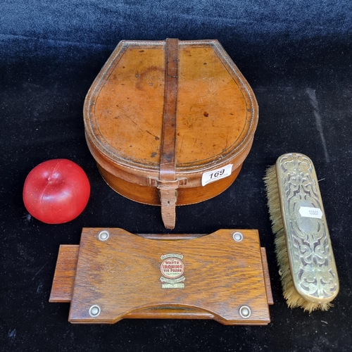 169 - Three vintage items including ''Watt's Ironing Tie Press'' and a pierced ladies' vanity brush with a... 