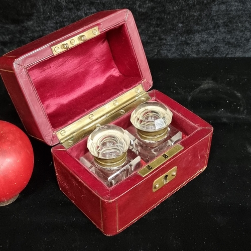 239 - A fabulous 19th Century carry case containing two crystal ink wells. Case finished in an oxblood col... 