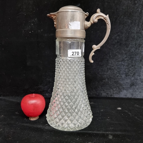 270 - A very impressive, very large cut glass vintage claret jug, with a wonderfully ornate pewter lid and... 