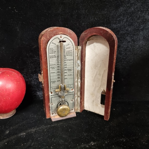 280 - A very rare lovely vintage German made pocket metronome with swinging brass pendulum and housed in a... 