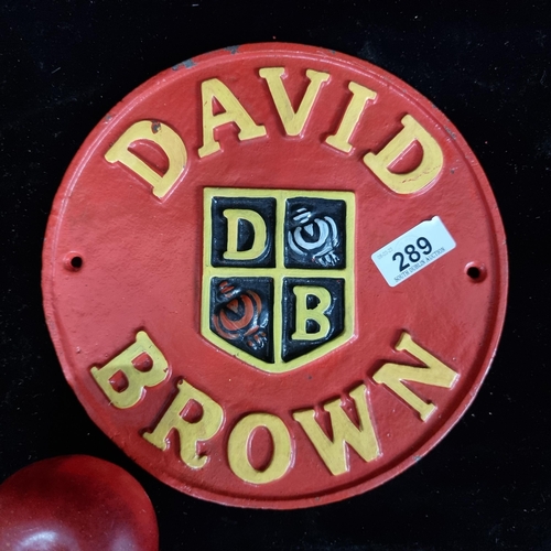 289 - A heavy round cast metal plaque reading 'David Brown' machinery and featuring company to centre. D23... 