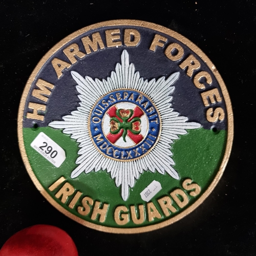 290 - A heavy quality round cast metal plaque reading 'HM Armed Forces Irish Guards' with insignia to cent... 