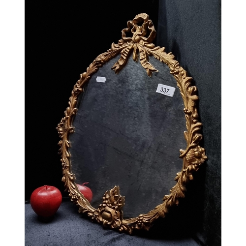 337 - A gorgeous example of an oval wall mirror set into a stunning Regency style gilded frame with a pret... 