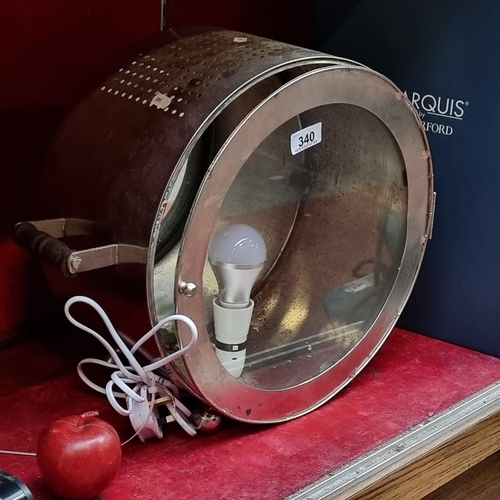 340 - A very cool industrial style drum shaped free standing light with two handles, bun feet, mirrored ba... 