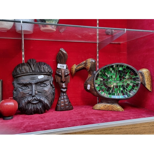 358 - Two vintage wooden hand carved items. Both depicting male faces including an African warrior example... 