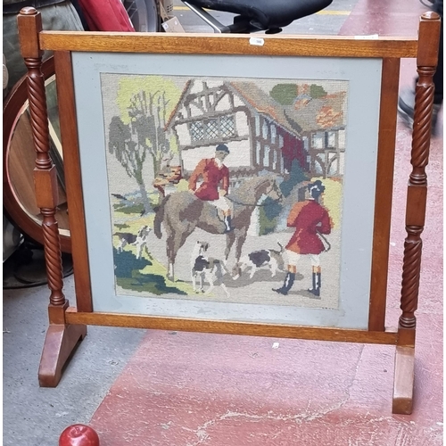 359 - A lovely vintage fire screen with an embroidered centre panel behind glass. Featuring a barley twist... 