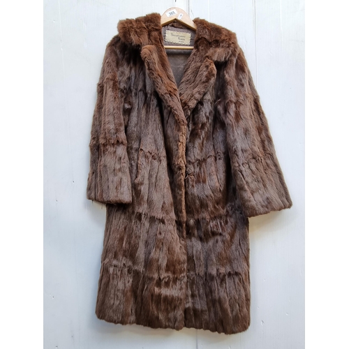 365 - A magnificent genuine squirrel fur ladies coat by Southern Furs Dublin. With satin lined interior an... 