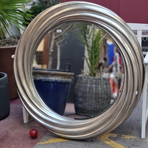 374 - Star Lot : A fabulous and very large circular wall mirror by R. V. Astley with a gold-toned frame an... 