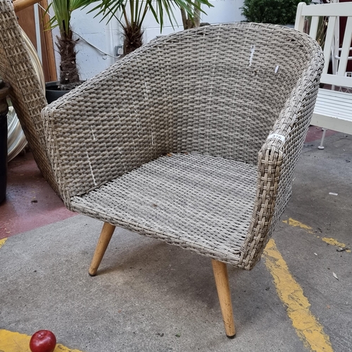 376 - A comfortable outdoor patio lounging chair with rattan construction and a generous seat. H85cm x W65... 