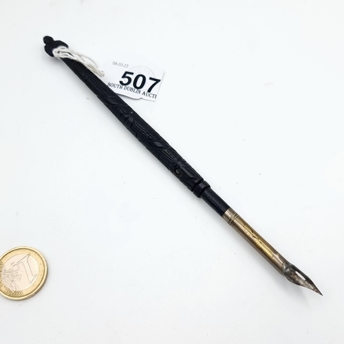 507 - An unusual Stanhope Irish pen, set with a hand carved ebonised bog oak body and featuring a handsome... 
