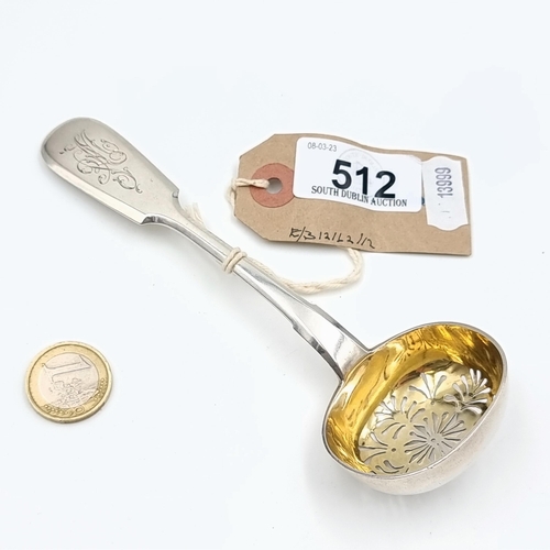 512 - Star lot : A beautiful example of an antique rare Russian silver sifting spoon, featuring stunning s... 