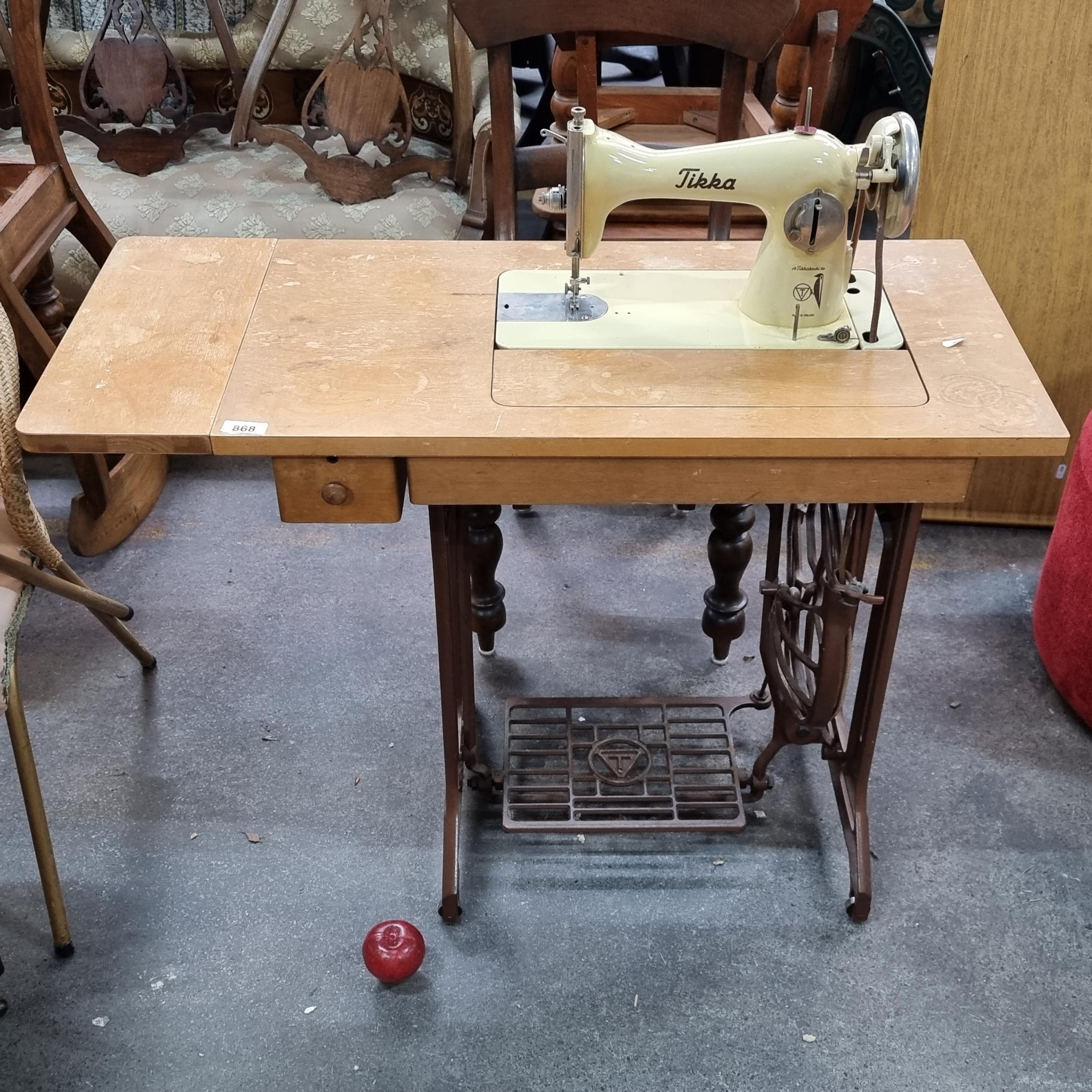 A really lovely vintage 1950s sewing machine table with integrated 
