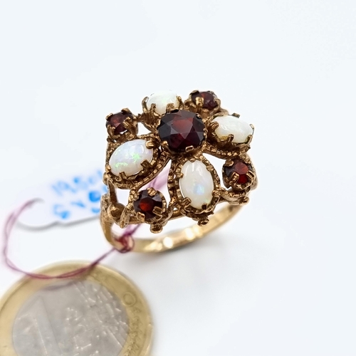 1 - Star lot : An exquisite and unusual antique 9 carat gold ring, set beautifully with Opal and Garnet ... 