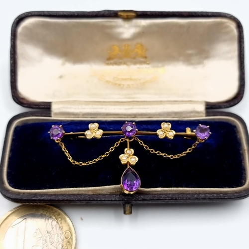 25 - Star Lot: A truly fabulous example of an antique Amethyst and Seed Pearl brooch, set beautifully wit... 