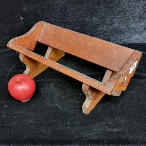 258 - A handsome stained oak-wood book trough. Very well crafted and excellent for desktop display.