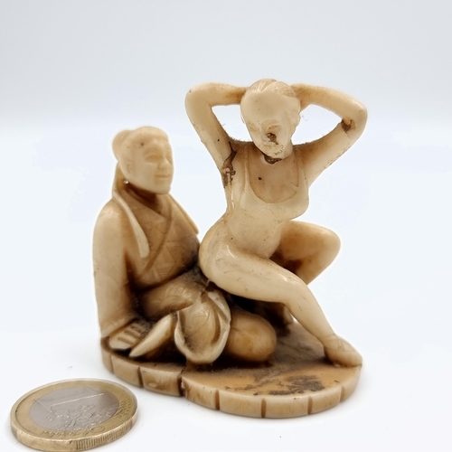 60 - A antique example of a Japanese erotic Shunga couple figure, of natural material. Circa late 19th ce... 
