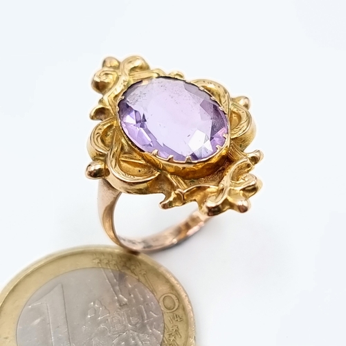 9 - A rare and beautiful example of a finely detailed 9 carat gold late-Georgian ring, set with a very l... 