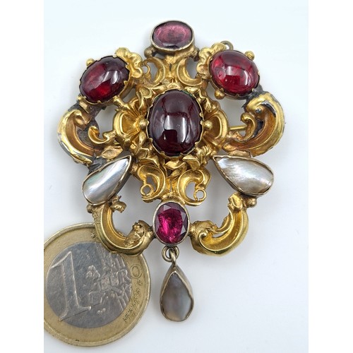 3 - Star Lot : A duo of beautiful antique pinch-back brooches, each set brilliantly with a Garnet and Sp... 