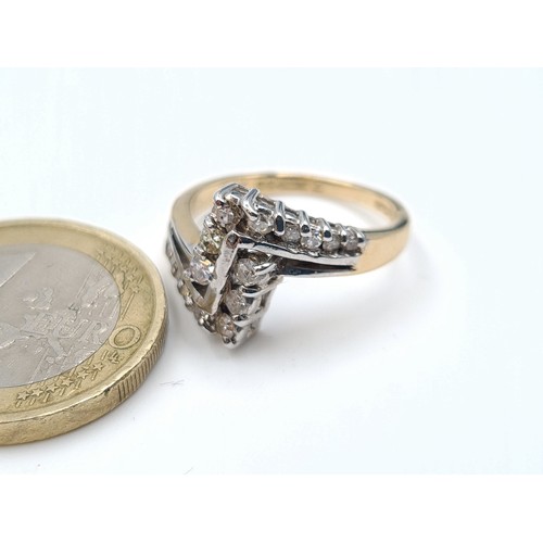 11 - A significant example of a 9 carat gold Chevron style multi stone Diamond ring. Ring size: M. Weight... 
