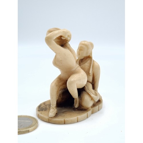60 - A antique example of a Japanese erotic Shunga couple figure, of natural material. Circa late 19th ce... 