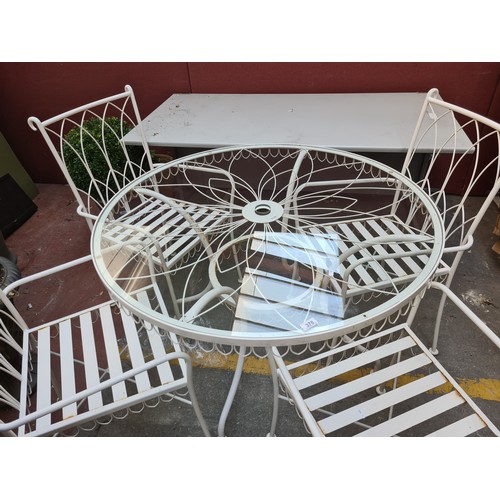 378 - Star Lot A gorgeous heavy super quality outdoor dining table with glass top and large floral design ... 