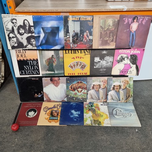 A selection of twenty vinyl albums / LPS. These records include artists ...