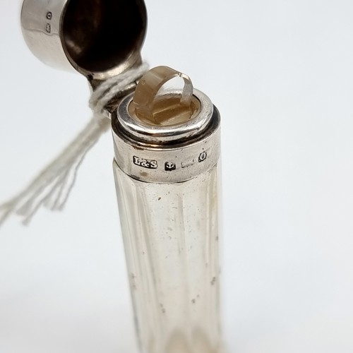 527 - An antique silver topped perfume file, set with original glass stopper. Hallmarked Birmingham, circa... 