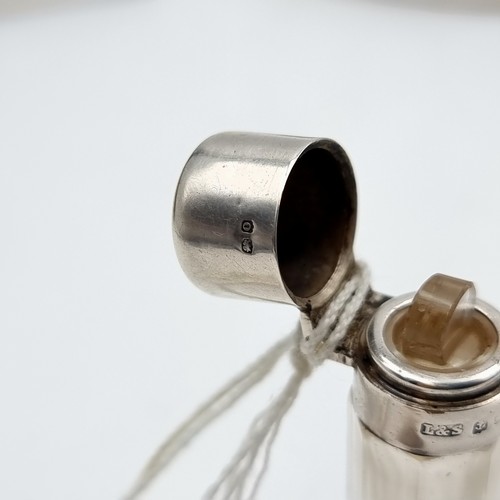 527 - An antique silver topped perfume file, set with original glass stopper. Hallmarked Birmingham, circa... 
