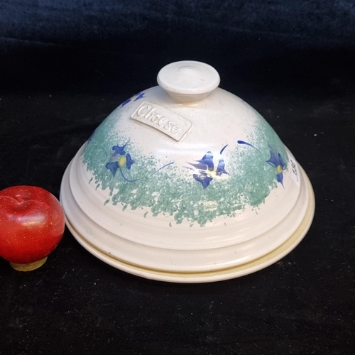 138 - A beautiful example of a Ballydougan Pottery lidded cheese bell dish. An Irish handmade piece boasti... 