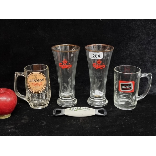 264 - A selection of five vintage breweriana items including two Carlsberg half pint glasses, a iconic Car... 