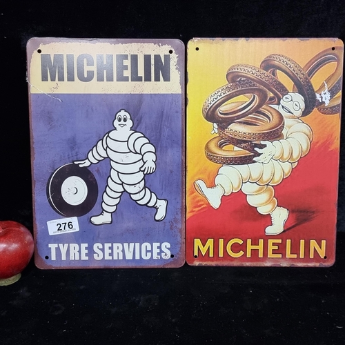 276 - Two metal wall plaques advertising Michelin tires.