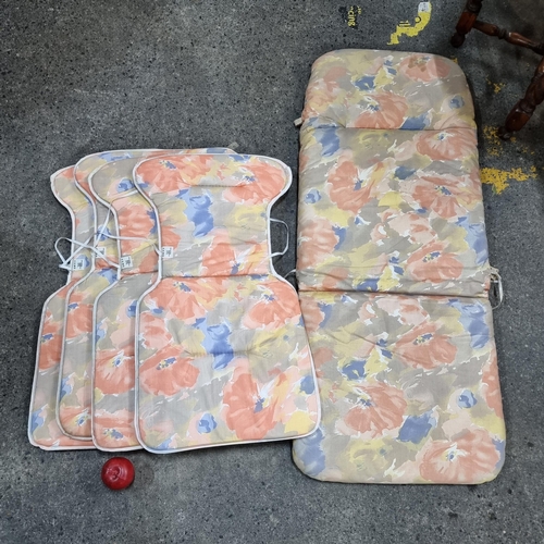 Five lounge cushions for garden chairs upholstered in a bright pastel fabric. 4 chairs and 1 lounger. Has a mid century vibe.