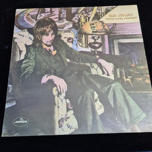 134 - A collection of eight fantastic vinyl records including albums by Bob Dylan, Rod Stewart, The Beach ... 