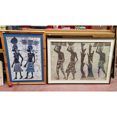 303 - Two fabulous large original batik fabric print artworks featuring tribal scenes of figures transport... 