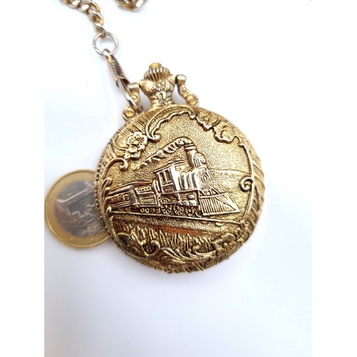 A citron international quartz pocket watch and chain set with profuse attractive detailing to front