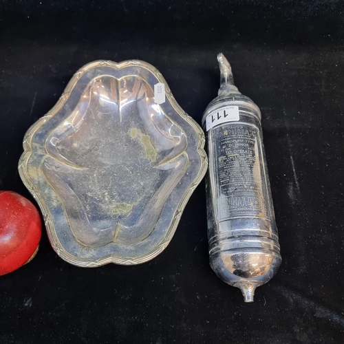 111 - Two good vintage items, comprising of a 1965 English made Minimax chrome car fire extinguisher and a... 