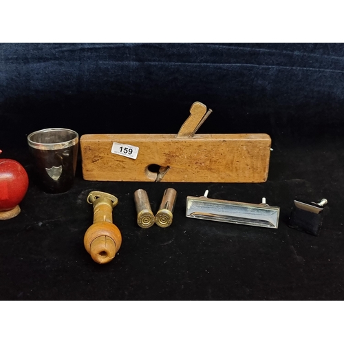 159 - A selection of seven miscellaneous items. Including a vintage wood plane and an EPNS rimmed horn pie... 