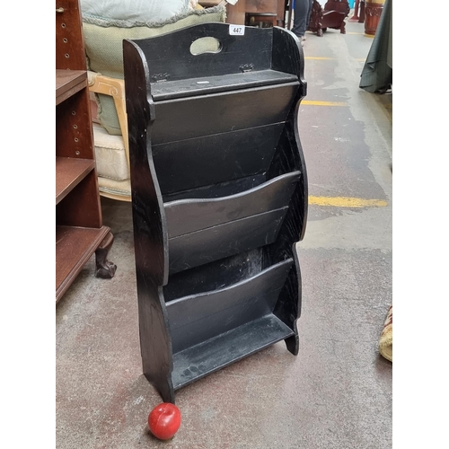 447 - A very useful vintage wall mounting magazine display rack. This piece is ideal for market vendors et... 