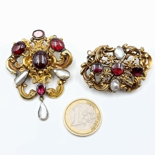 Star Lot : A duo of beautiful antique pinch-back brooches, each set brilliantly with a Garnet and Split Pearl setting. Both original pins intact. Weight: first 11.1 grams and 9.11 grams. The following lots are is the remaining stock of   notable antique jewellery dealer, Who retired during Covid, which we are delighted to bring to market. Fabulous items. Reenterd due to non payment.