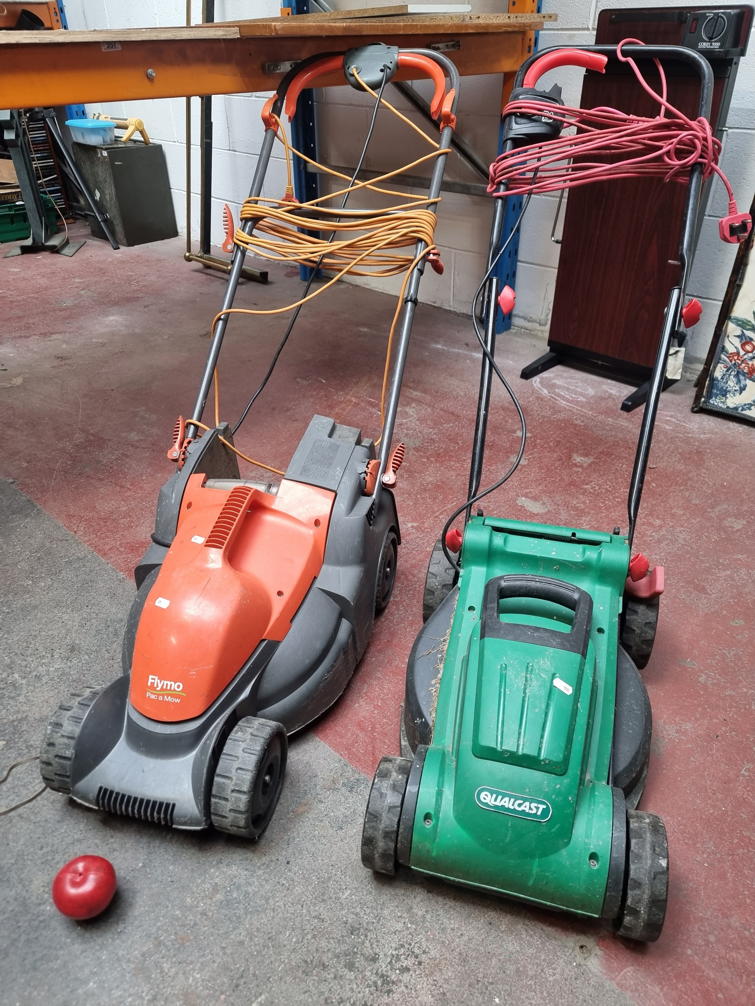 Two lawnmowers including a Qualcast branded corded lawnmower model