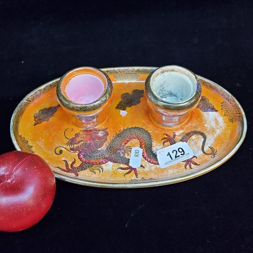 129 - A wonderful Maling Pottery Newcastle double ink well stand, with an orange glaze and beautifully ill... 