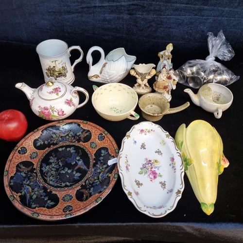 136 - A box containing a selection of ceramic items including a New Chelsea tea pot, a Royal Windsor mug i... 